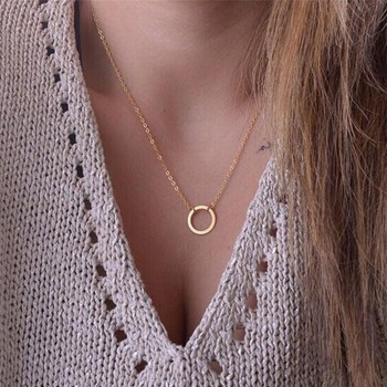Gold necklace with round pendant